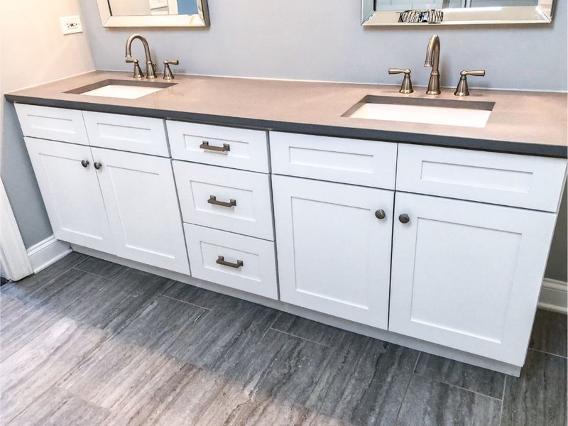 White bathroom cabinets in a Minnesota home