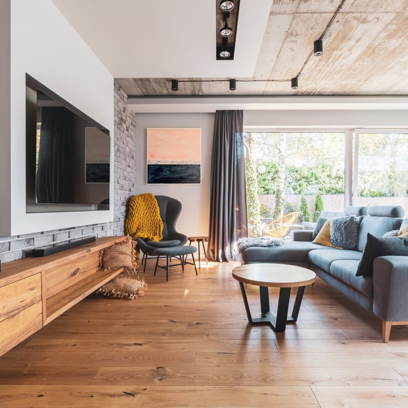 Rustic living room with natural hardwood flooring