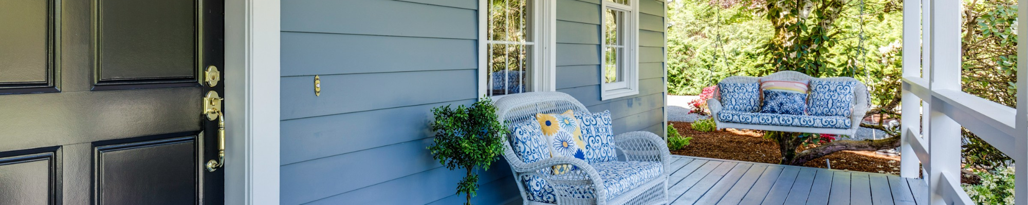 Exterior of home painted blue in Lakeville MN
