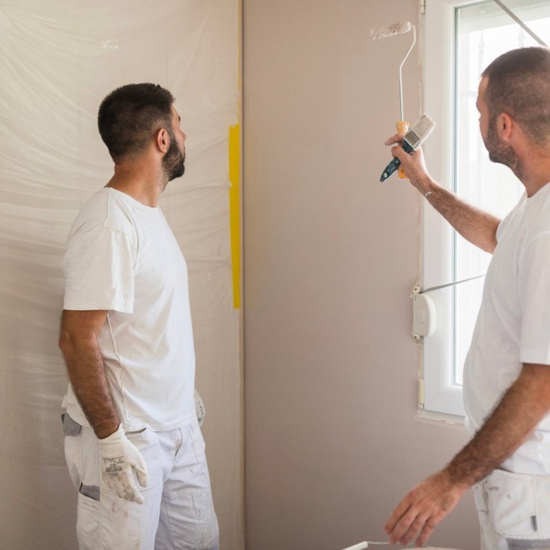 Professional painters planning in home project