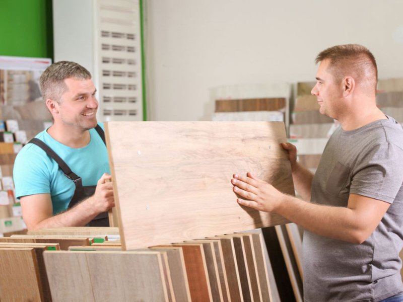 Selecting hardwood flooring in a Minnesota flooring showroom