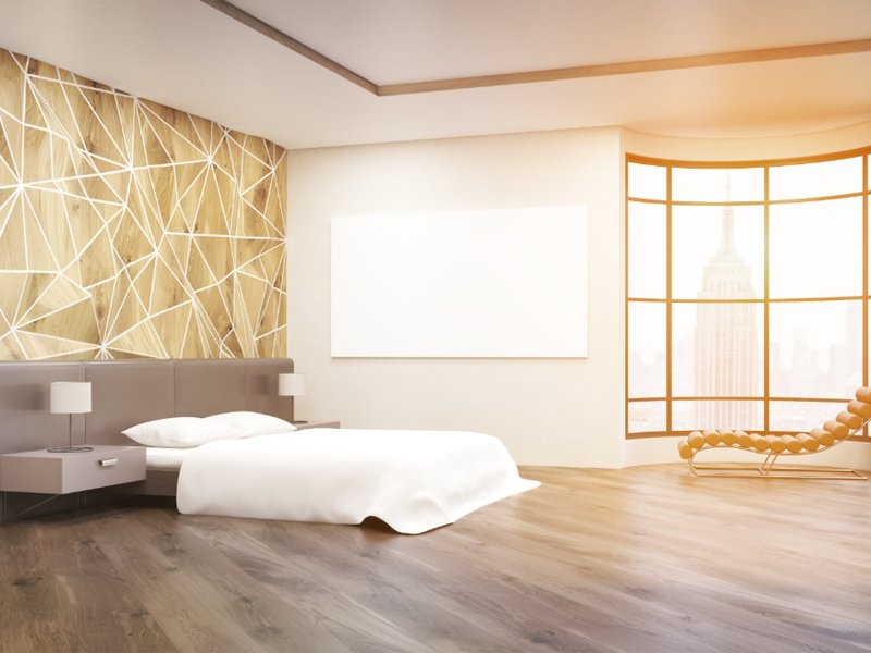 Classic hardwood flooring in a modern bedroom