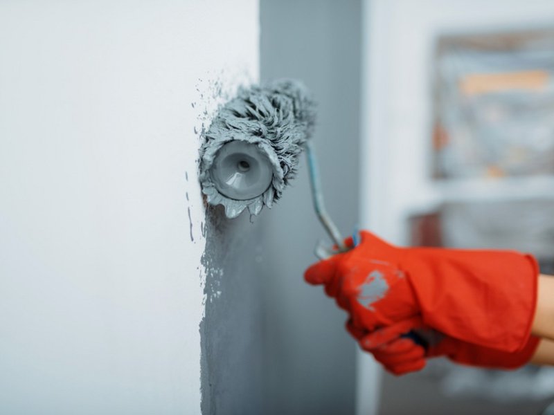 Professional using a paint roller